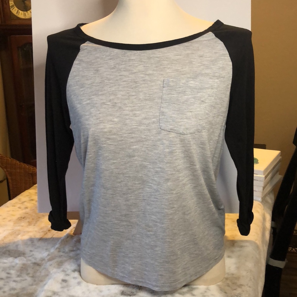 Divided Baseball Tee Grey/Black. 3/4 cuff sleeves hi-low hem.